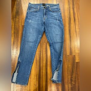 Just Black Denim with zippers on flared ends. Size 25.